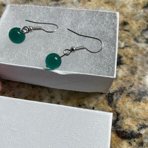 Pierced emerald look drop earrings, silver